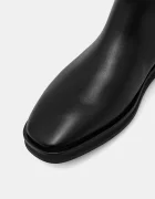 Calvin Klein Кожени ботуши FORMAL UTK BOOT LTH в черно с равна подметка HW0HW02599