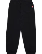 Diesel панталон джогър за деца с памук PRES TROUSERS черен със стандартна талия J03031
