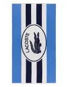 Lacoste Памучна плажна кърпа L BADGE Marine 90 x 160 cm
