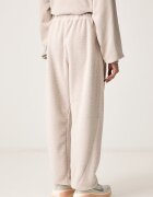 Nike Sportswear спортен панталон дамски от полар бежов със стандартна талия IU5217.236