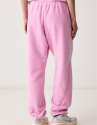 Nike Sportswear спортен панталон дамски от полар розов със стандартна талия IU5217.621