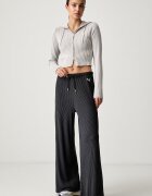 Puma спортен панталон дамски с вискоза Essentials Ribbed сив с висока талия 636667
