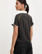 Puma Тениска с яка дамска в черно 632157