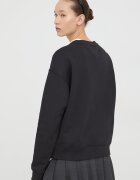 Tommy Jeans Памучен суичър в черно с апликация DW0DW17325