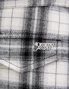 Tommy Jeans Памучна пола в черно къса със стандартна кройка DW0DW21461