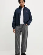 Tommy Jeans Яке в тъмносиньо преходен модел DM0DM21936