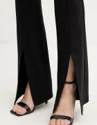 Versace Jeans Couture Панталон в черно с разкроени краища с висока талия 79HAA103 J0092