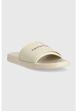 Calvin Klein Jeans Чехли SLIDE MONOGRAM TPU В бежово - Pepit.bg