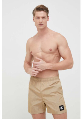 Calvin Klein Плувни шорти в бежово - Pepit.bg