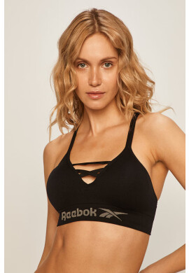 Reebok Спортен сутиен в оранжево с изчистен дизайн - Pepit.bg