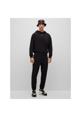 Hugo Долнище анцуг Drasilia 50486457 Черен Relaxed Fit - Pepit.bg