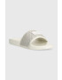 Calvin Klein Jeans Чехли SLIDE BADGE WN в бежово YW0YW00997 - Pepit.bg