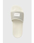 Calvin Klein Jeans Чехли SLIDE BADGE WN в бежово YW0YW00997 - Pepit.bg