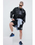 New Balance Памучна тениска в черно с принт - Pepit.bg