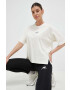 New Balance Тениска Athletics Remastered в бежово - Pepit.bg