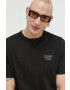 Tommy Jeans Памучна тениска в черно с апликация - Pepit.bg