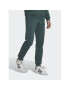 adidas Долнище анцуг adicolor Essentails Trefoil HK0106 Зелен Slim Fit - Pepit.bg