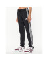 adidas Долнище анцуг Essentials Warm-Up 3-Stripes H48451 Черен Regular Fit - Pepit.bg