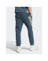 adidas Долнище анцуг Future Icons 3-Stripes Joggers IJ6372 Електриков Slim Fit - Pepit.bg