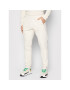 adidas Долнище анцуг adicolor Essentials HE9410 Бежов Slim Fit - Pepit.bg