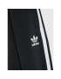 adidas Долнище анцуг adicolor Wide HK0347 Черен Regular Fit - Pepit.bg