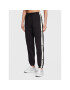 Champion Долнище анцуг Slide Tape 115576 Черен Regular Fit - Pepit.bg