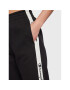 Champion Долнище анцуг Slide Tape 115576 Черен Regular Fit - Pepit.bg