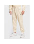 Karl Kani Долнище анцуг Small Signature Logo Pinstripe 6004670 Бежов Relaxed Fit - Pepit.bg