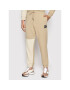 New Balance Долнище анцуг MP21550 Бежов Regular Fit - Pepit.bg
