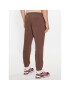 New Balance Долнище анцуг NB Essentials Sweatpant MP33509 Кафяв Regular Fit - Pepit.bg