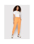 New Balance Долнище анцуг WP21503 Оранжев Relaxed Fit - Pepit.bg