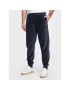 Tommy Hilfiger Долнище анцуг Velour UM0UM02669 Тъмносин Relaxed Fit - Pepit.bg