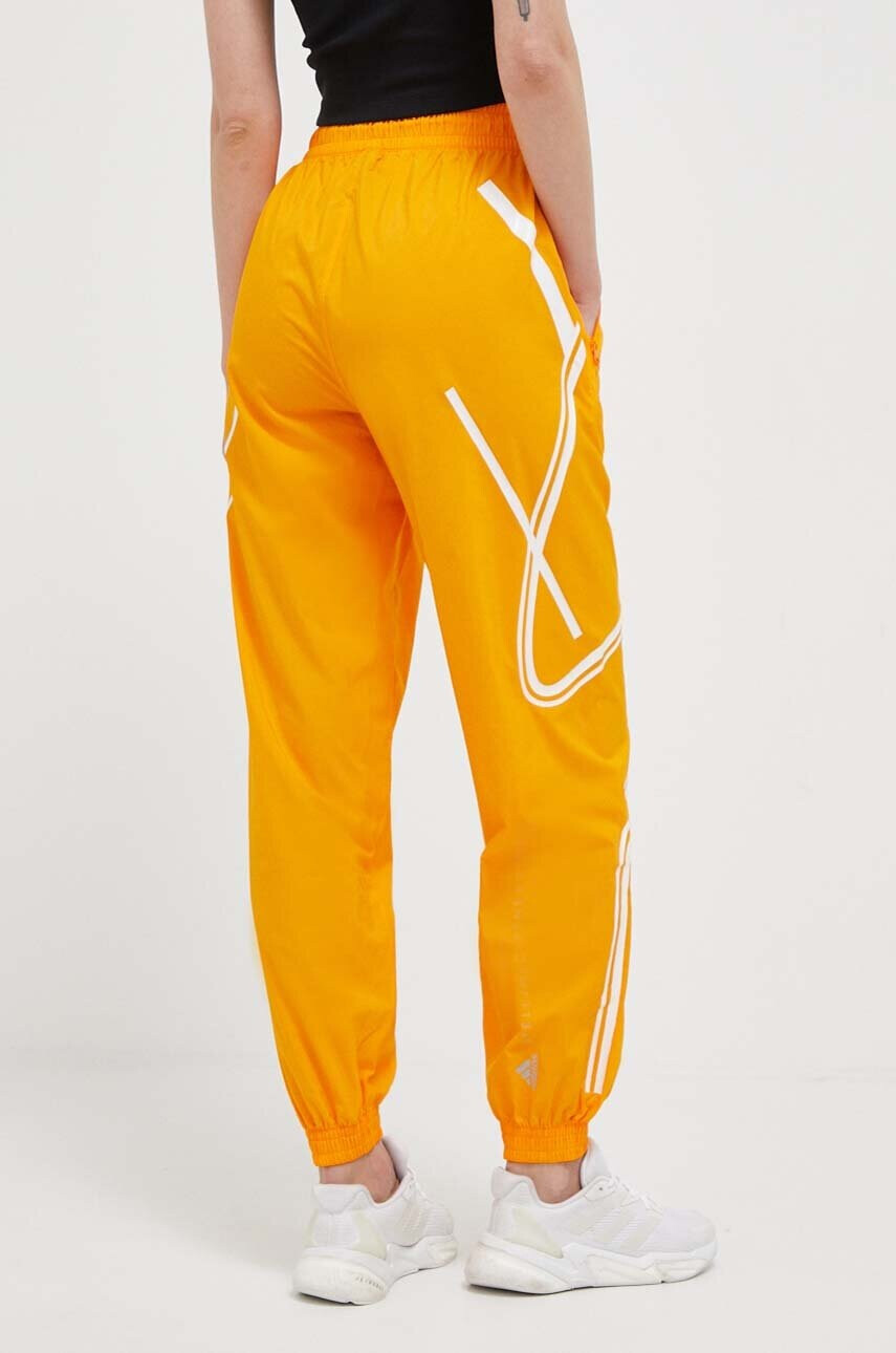adidas by Stella McCartney Панталон за трениране TruePace в оранжево с принт - Pepit.bg