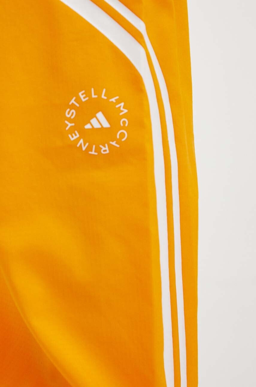 adidas by Stella McCartney Панталон за трениране TruePace в оранжево с принт - Pepit.bg