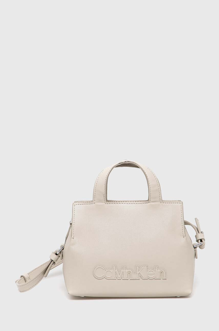 Calvin Klein Чанта в бежово - Pepit.bg