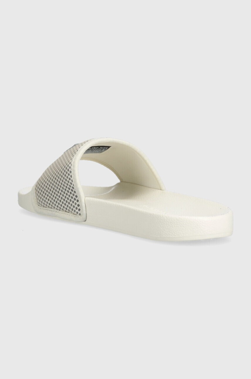 Calvin Klein Jeans Чехли SLIDE BADGE WN в бежово YW0YW00997 - Pepit.bg