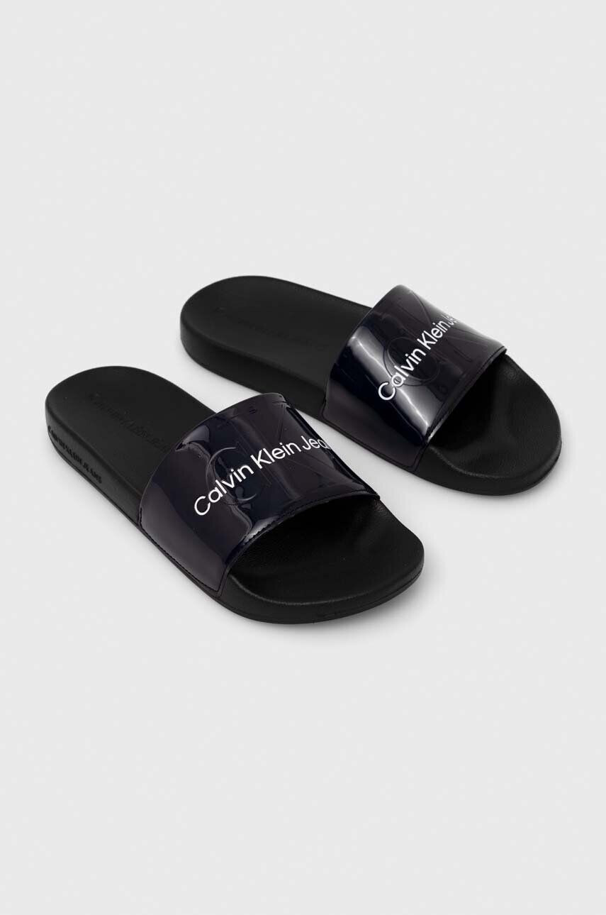 Calvin Klein Jeans Чехли SLIDE METALLIC MONOLOGO в черно YW0YW00638 - Pepit.bg