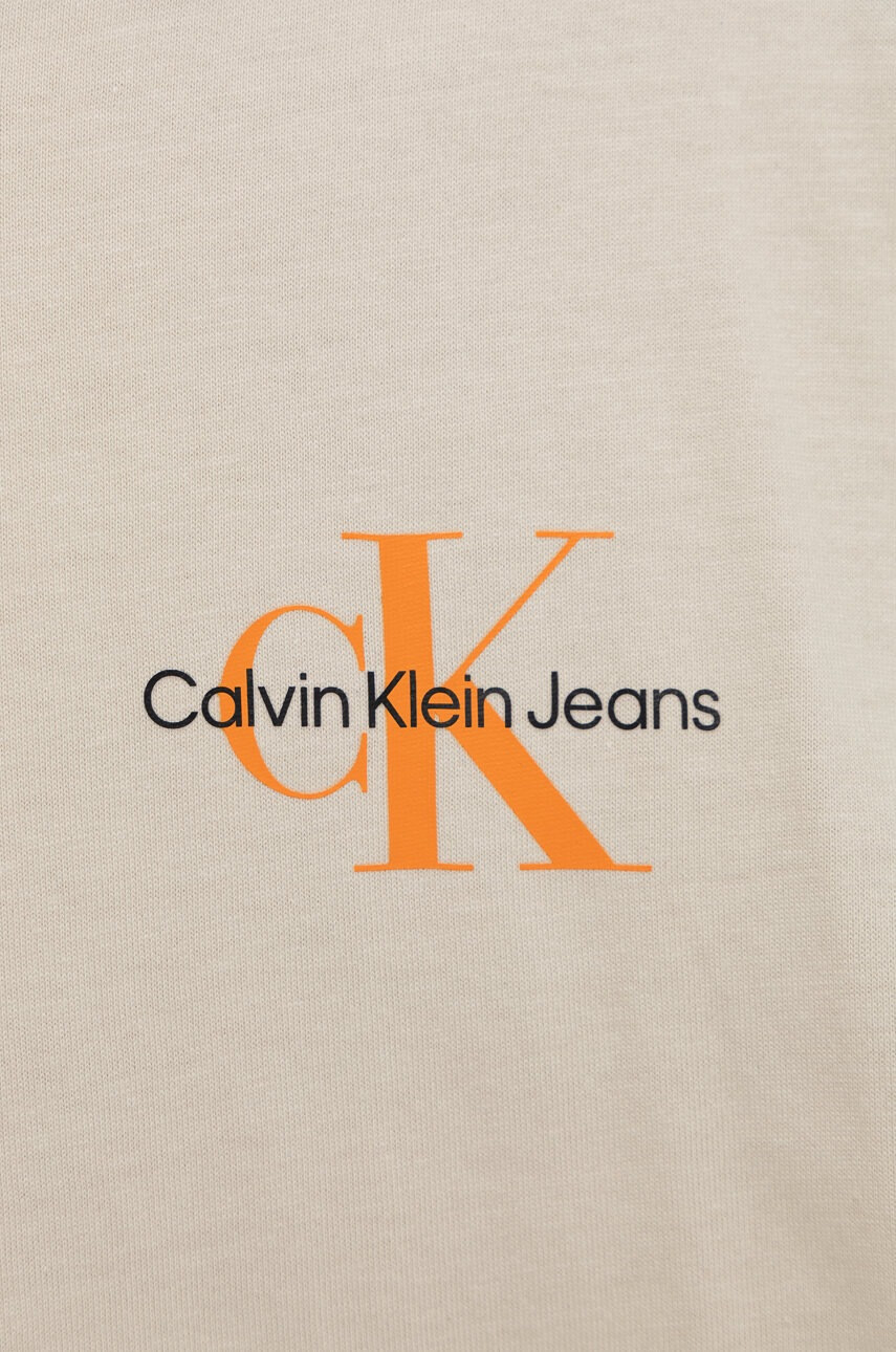 Calvin Klein Jeans Детска памучна тениска в бежово с принт - Pepit.bg