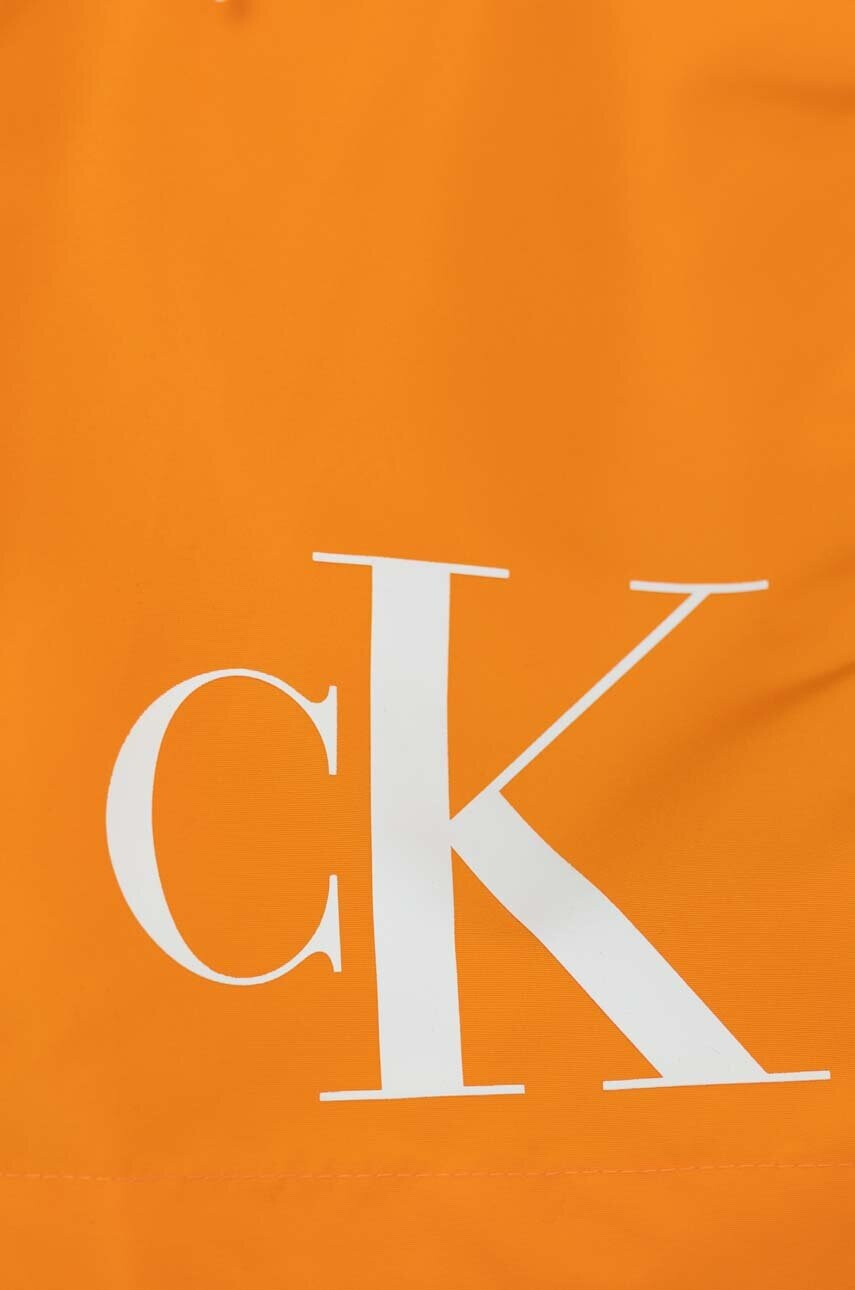 Calvin Klein Jeans Детски плувни шорти в оранжево - Pepit.bg