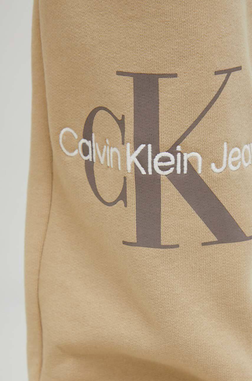 Calvin Klein Jeans Спортен панталон в бежово с принт - Pepit.bg