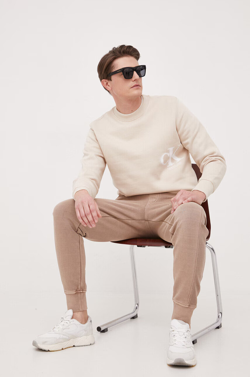 Calvin Klein Jeans Суичър в бежово с принт - Pepit.bg