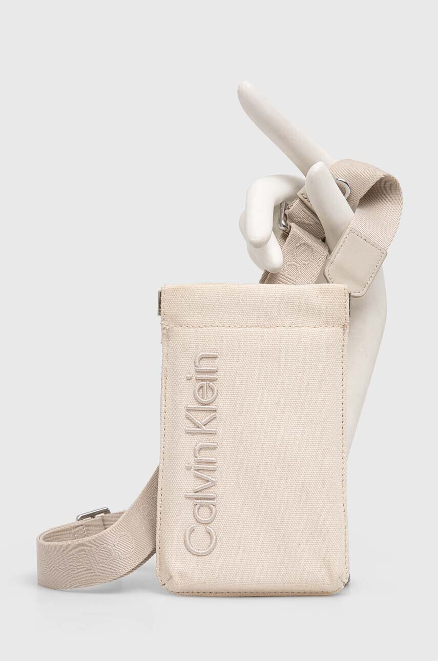 Calvin Klein Кейс за телефон в бежово - Pepit.bg