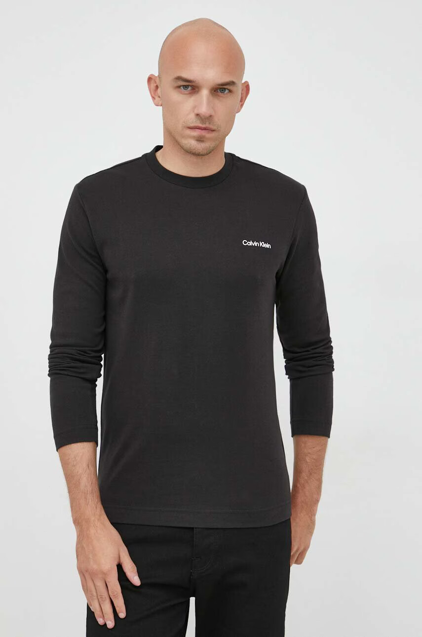 Calvin Klein Памучна блуза с дълги ръкави в черно с принт - Pepit.bg