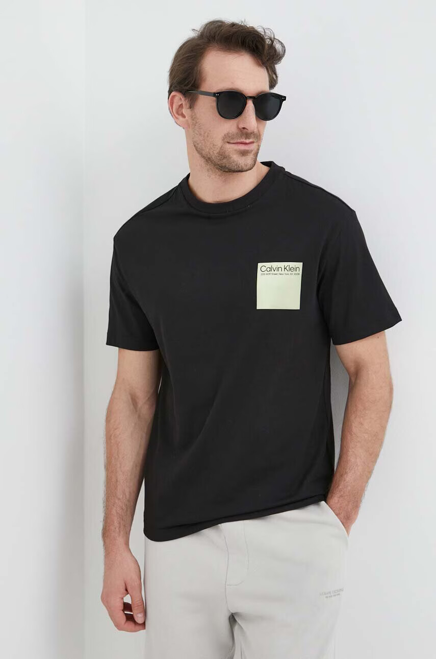 Calvin Klein Памучна тениска в черно с принт - Pepit.bg