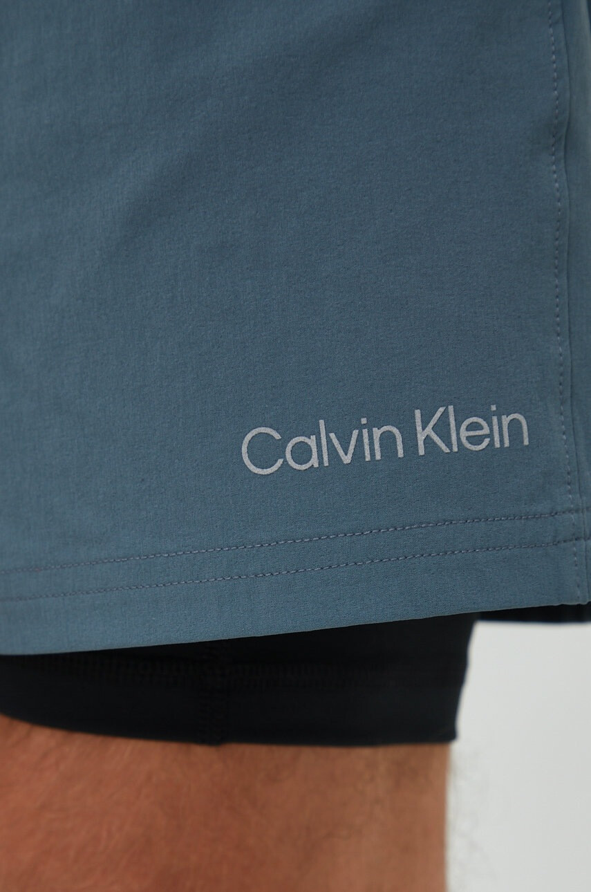 Calvin Klein Performance Къс панталон за трениране Ck Essentials в зелено - Pepit.bg