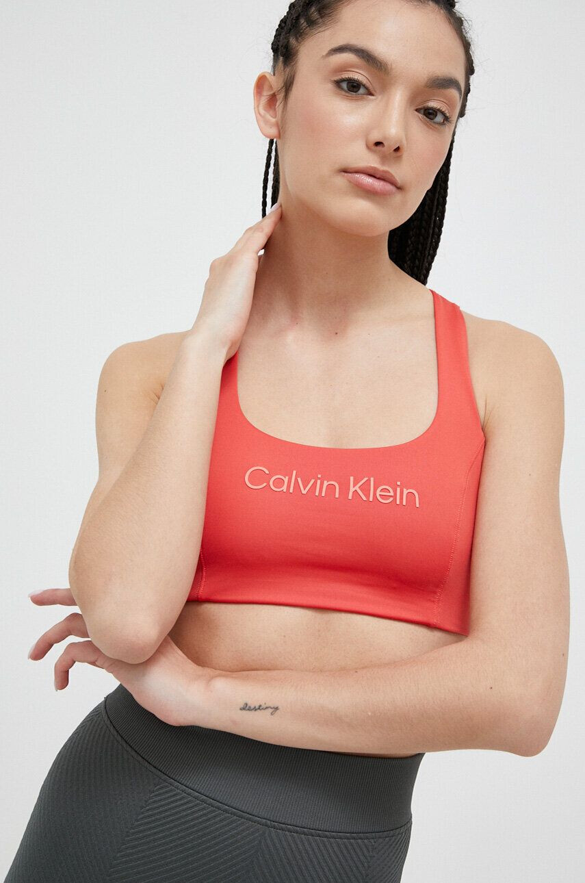 Calvin Klein Performance Спортен сутиен Essentials в оранжево - Pepit.bg