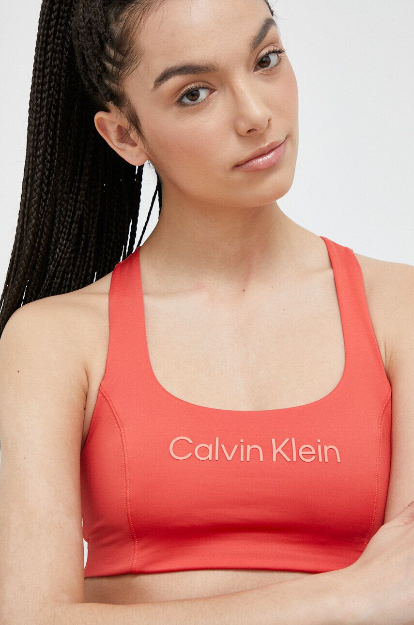 Calvin Klein Performance Спортен сутиен Essentials в оранжево - Pepit.bg