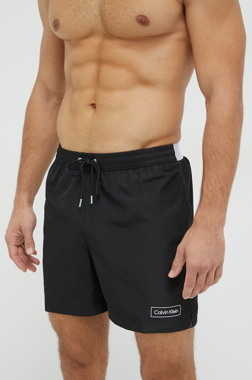 Calvin Klein Плувни шорти в черно - Pepit.bg