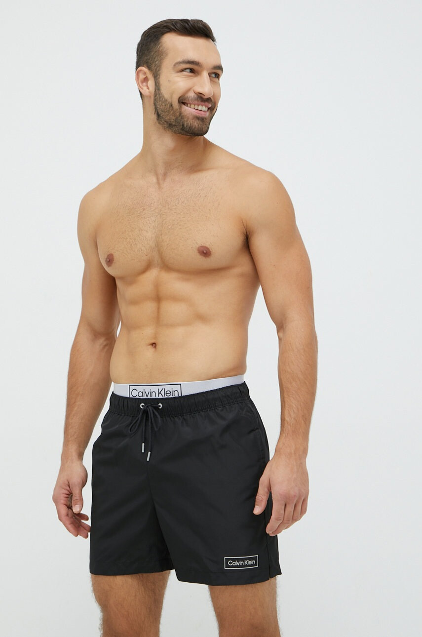 Calvin Klein Плувни шорти в черно - Pepit.bg