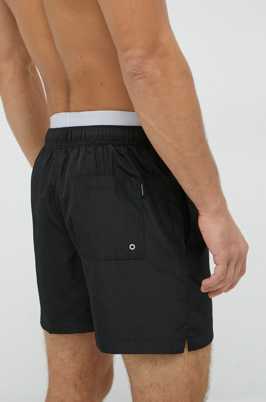 Calvin Klein Плувни шорти в черно - Pepit.bg